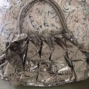 Metallic blush purse handbag with ruffles